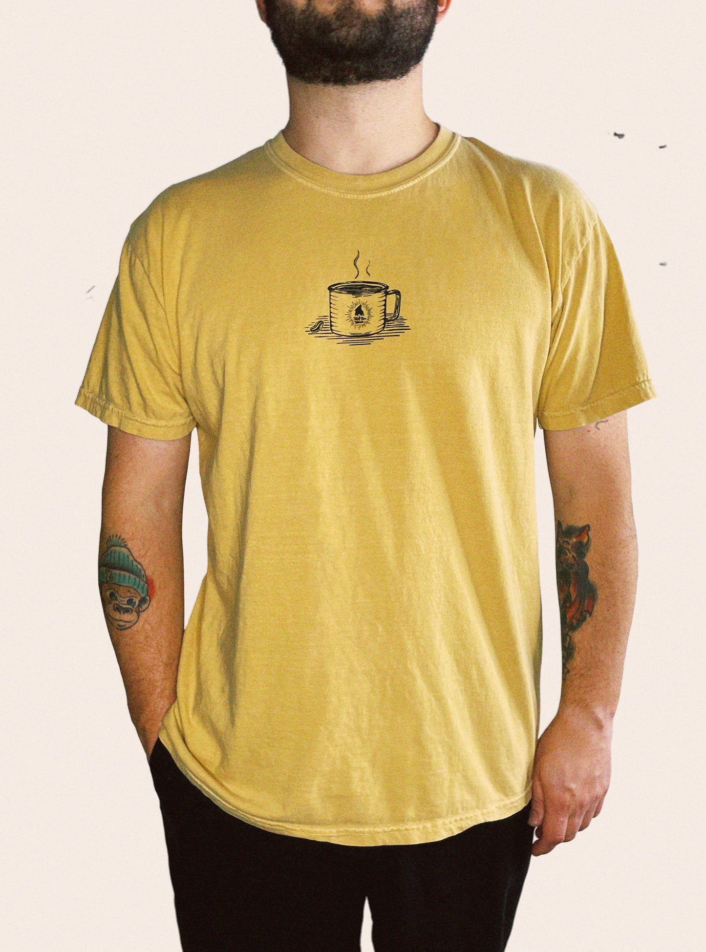 Mustard Comfort Colors tee embellished with a Wolf Den Wares branded camp coffee mug