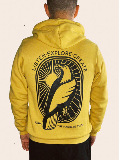 Gold Bella Canvas sponge fleece hooded sweatshirt embellished with Listen. Explore. Create. IOWA THE HAWKEYE STATE and a hawk