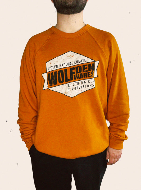Autumn Orange Bella Canvas sponge fleece crewneck sweatshirt embellished with the words LISTEN. EXPLORE. CREATE., WOLF DEN WARES CLOTHING CO & PROVISIONS