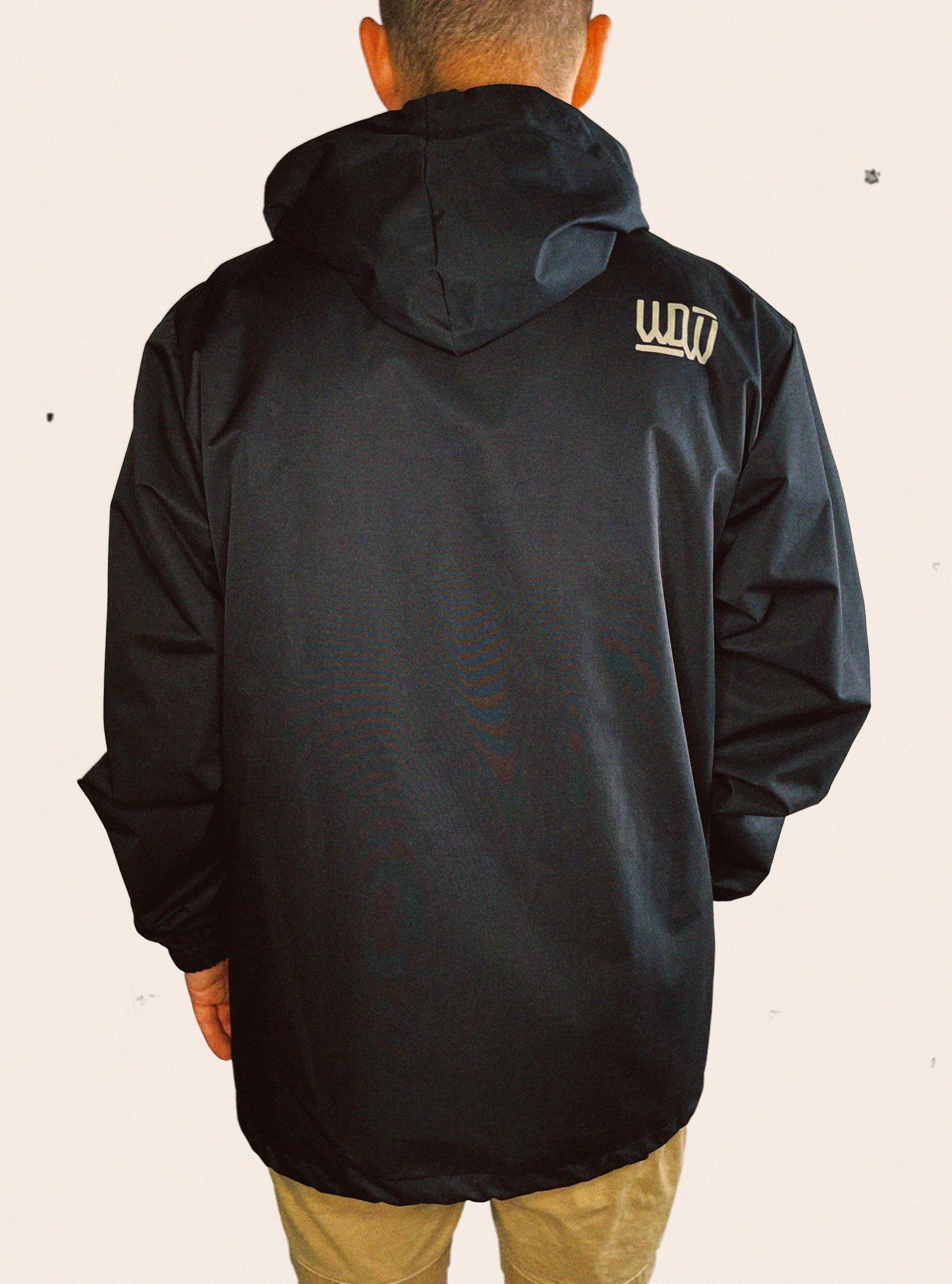 Black Independent Trading Company hooded shell jacket with gold snap buttons